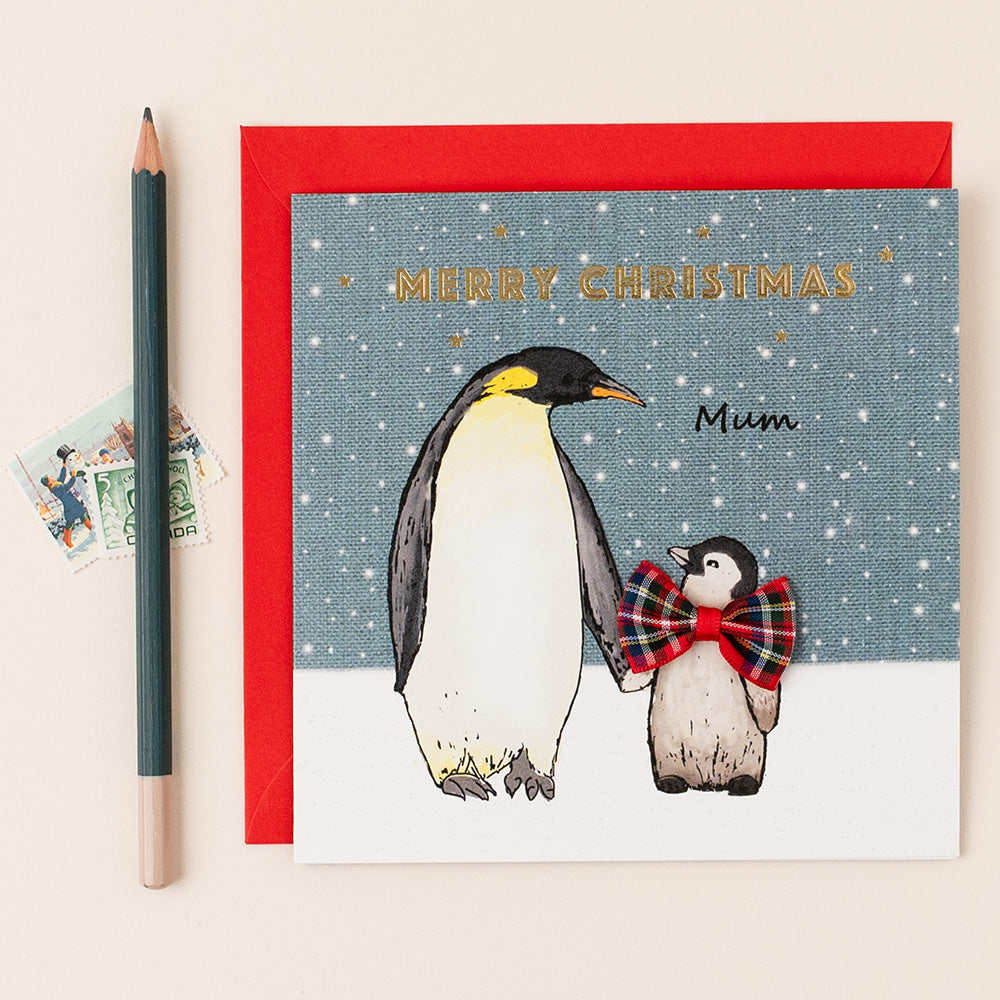 Christmas card with penguins and 'Merry Christmas Mum' text, featuring a red envelope.