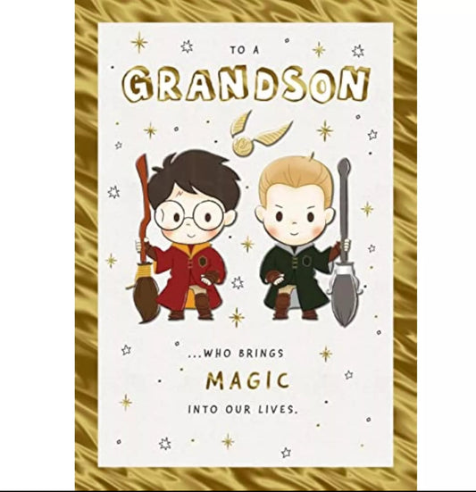 Card with cartoon characters holding wands, text 'To a Grandson... who brings magic into our lives.' on a gold background.