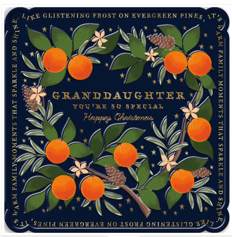 Decorative Granddaughter Christmas card with oranges, leaves, and text on a dark blue background