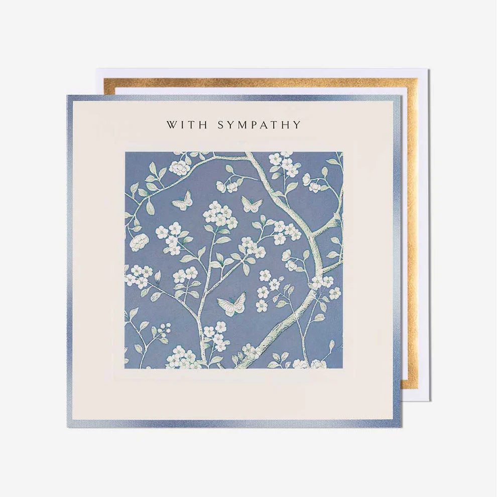 Sympathy card with floral design and 'With Sympathy' text on a white background