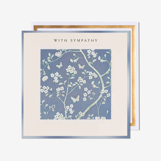 Sympathy card with floral design and 'With Sympathy' text on a white background