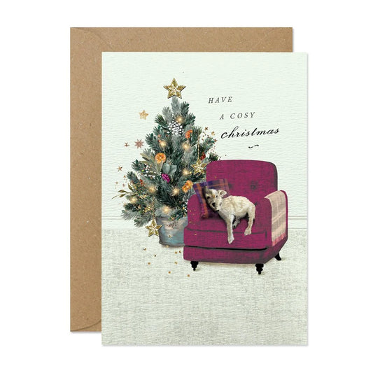 Christmas card with a tree and chair illustration and 'Have a Cosy Christmas' text.