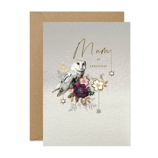 Greeting card with owl illustration and floral elements on a textured background